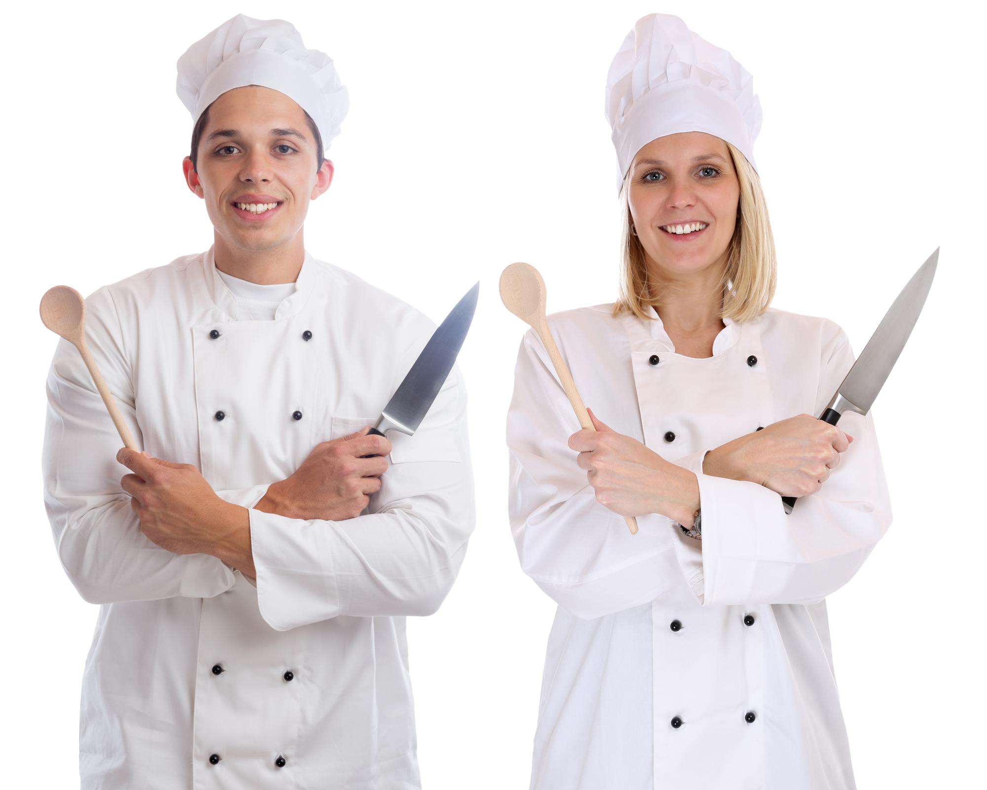 Chef demonstrating knife technique to students
